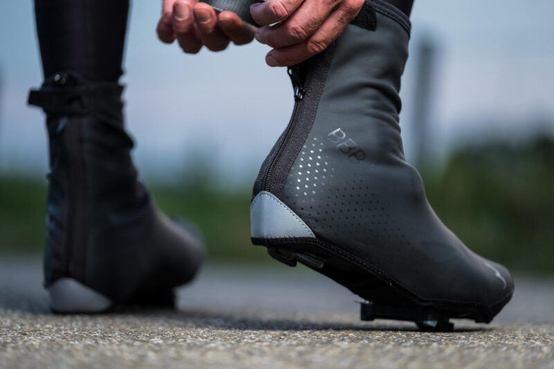 Overshoes have the added advantage of keeping your your nice cycling shoes clean.